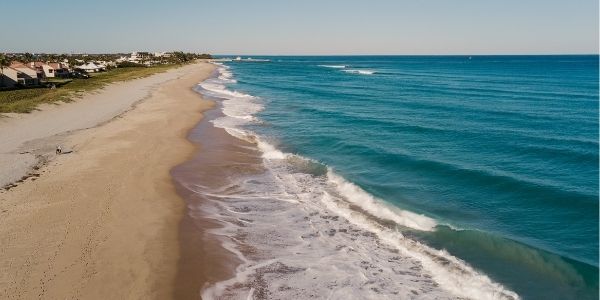 To explore the beaches in Palm Beach